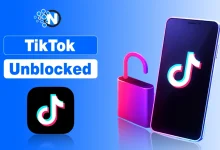 Gemini said An image featuring the TikTok logo on a smartphone screen next to an open pink padlock, with the bold text "TikTok Unblocked" and a blue circular "N" logo in the upper left corner, all set against a vibrant blue gradient background.