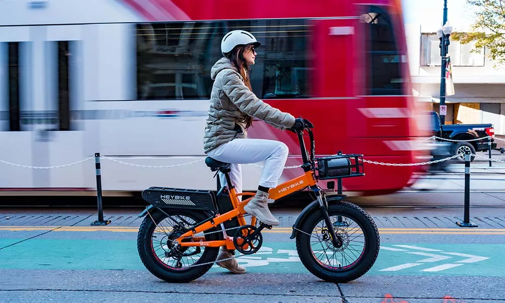 A girl riding on heybike folding e-bike for training