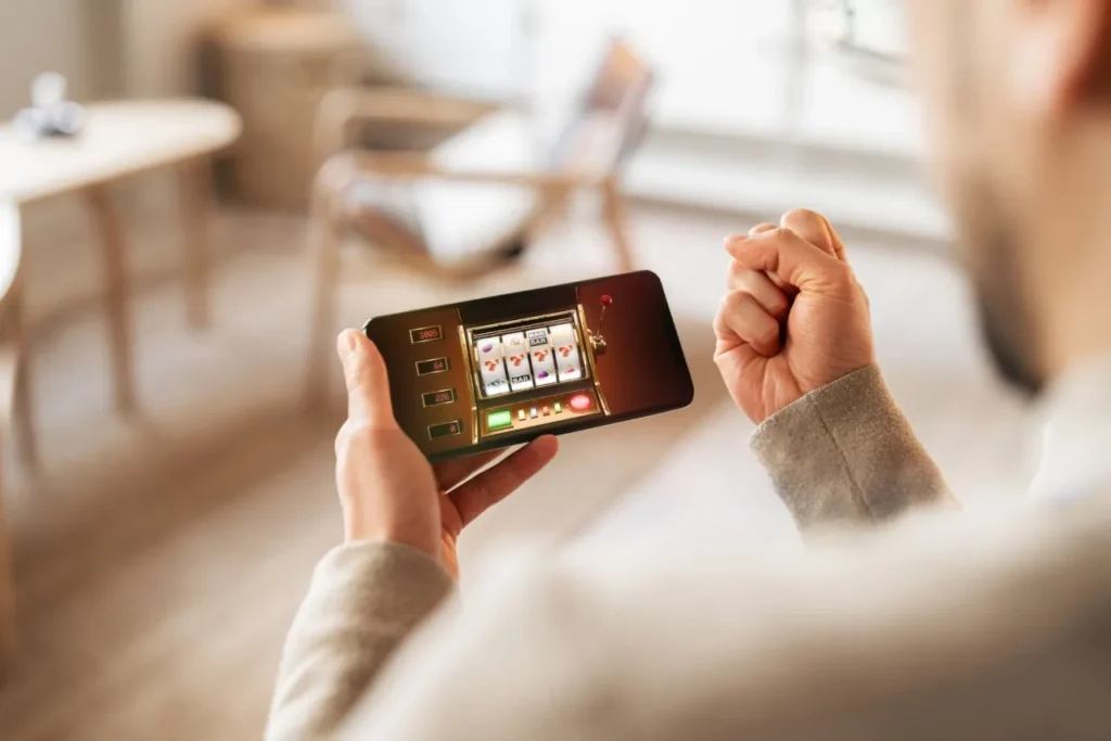Man playing game on mobile