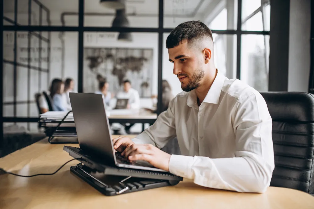 Boy Working on Laptop