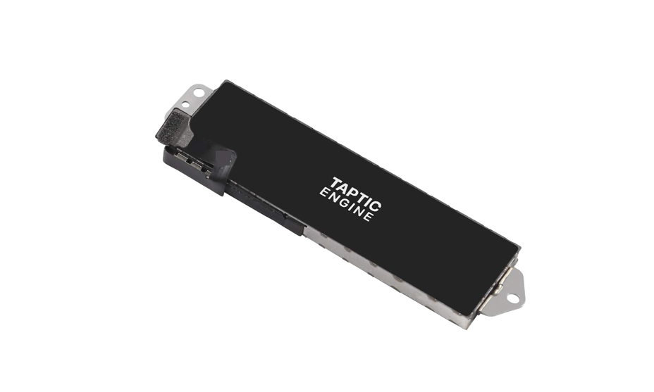 Close-up image of Apple’s Taptic Engine component, the hardware responsible for generating haptic feedback in iPhones.