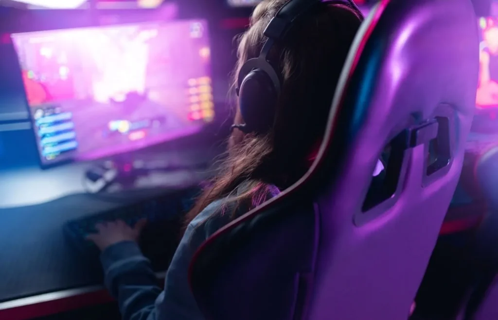 A girl playing online game on PC