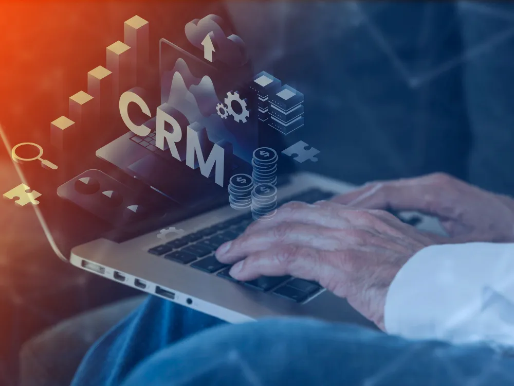 CRM developer working on a Laptop