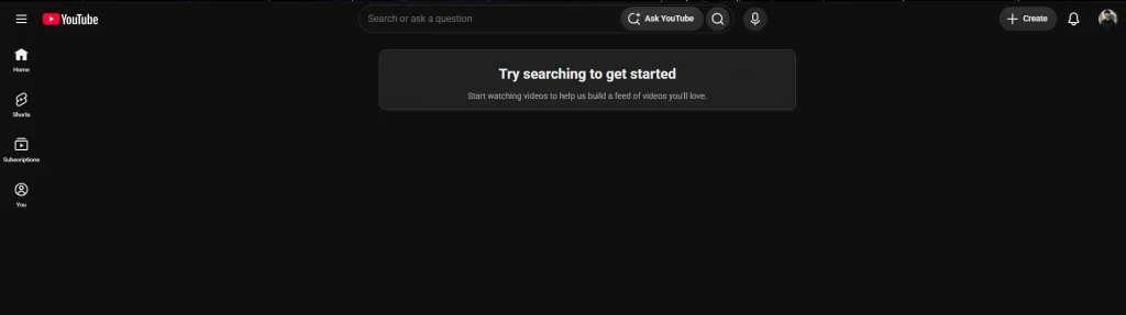 The YouTube homepage in dark mode 
