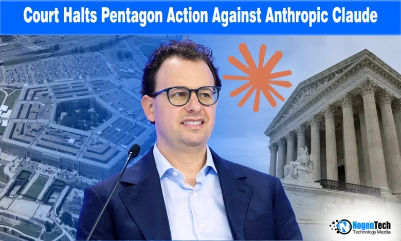 A gavel striking in front of the Pentagon and Anthropic logos with text "U.S. Federal Judge Blocks Pentagon's Supply Chain Ban on Anthropic's Claude."