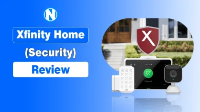 Xfinity Home Security Review graphic featuring a touchscreen control panel, indoor camera, keypad, and door sensor against a blue background.