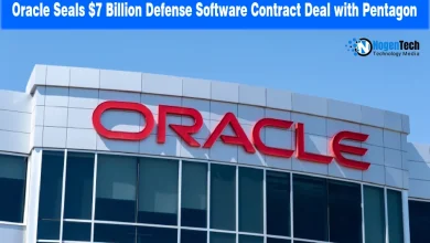 Large red Oracle logo displayed on the exterior facade of a modern corporate building.