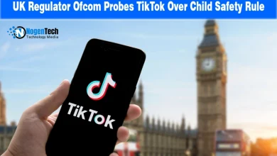 Hand holding smartphone displaying the TikTok logo with London's Big Ben in the background.