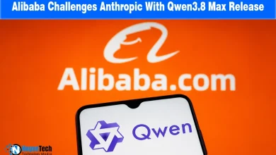 Smartphone displaying the Qwen logo held in front of an orange Alibaba background.