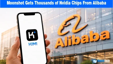 Smartphone showing the Kimi AI logo held in front of an Alibaba corporate building.