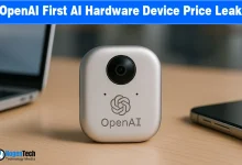 Compact metallic OpenAI hardware device with a camera lens resting on a desk.