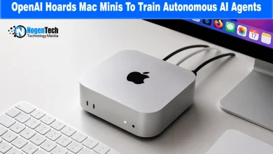 Silver Mac Mini connected to a monitor and keyboard on an office desk with NogenTech branding.