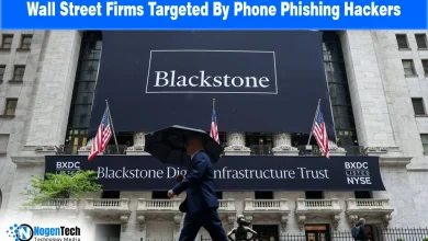 Exterior view of a Wall Street financial institution featuring a large Blackstone building banner.