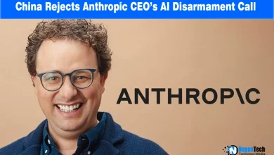 Portrait of Anthropic CEO Dario Amodei smiling against a beige background with the Anthropic logo.