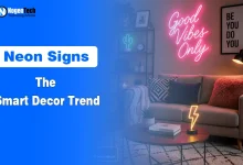 Modern living room interior with glowing pink Good Vibes Only neon sign above a sofa.