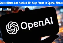 Smartphone screen displaying white OpenAI logo against a blurred city lights background.