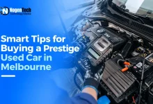 Mechanic inspecting a Volkswagen engine during a pre-purchase inspection of a used luxury car in Melbourne.