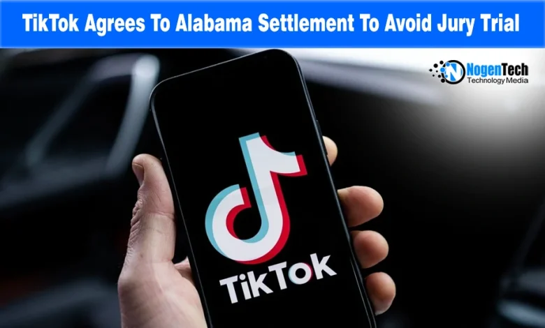 Smartphone held in hand displaying the TikTok logo on screen.