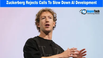 Mark Zuckerberg speaking on stage with hand gestures in a black shirt.