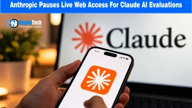 Hand holding a smartphone with the orange Claude AI logo app icon displayed on the screen.