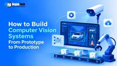 Monitor displaying bounding boxes around detected cars and pedestrians alongside a robotic arm and conveyor belt.