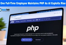Laptop screen displaying the official PHP web page on php.net.