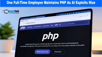Laptop screen displaying the official PHP web page on php.net.