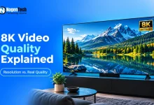 Large 8K Ultra HD television displaying a sharp landscape scene in a living room.